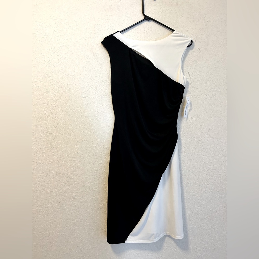 Black and white with a keyhole cut out in the back .